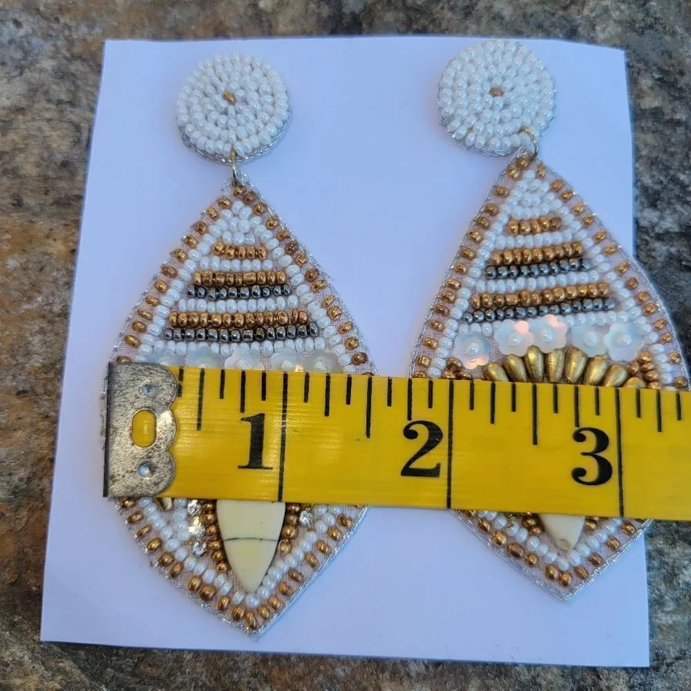 White Seed Beaded Fish Eyed Earrings in Goldtone